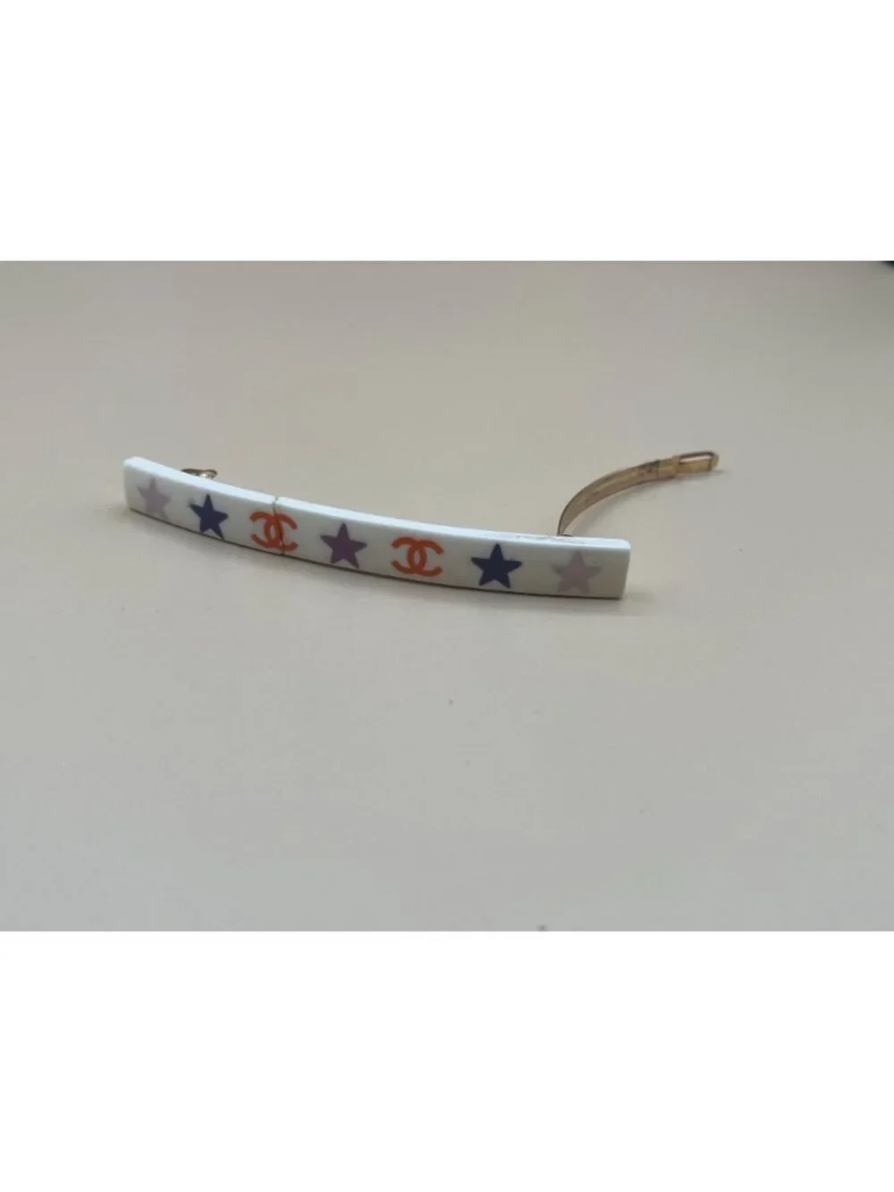 Authentic vintage Chanel bar barrette in cream-white resin, printed with two red
